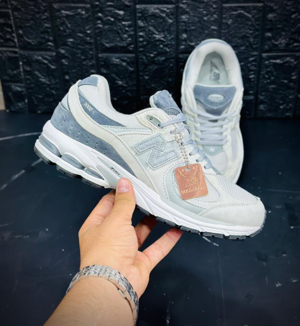 کتونی نیوبالانس۲۰۰۲R. ساخت ویتنام سایز بندی ۴۰ تا ۴۵ . فروش بصورت عمده و تک .New balance 2002R vietnam