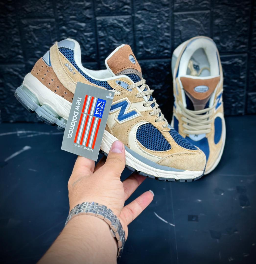 کتونی نیوبالانس۲۰۰۲R. ساخت ویتنام سایز بندی ۴۰ تا ۴۵ . فروش بصورت عمده و تک .New balance 2002R vietnam
