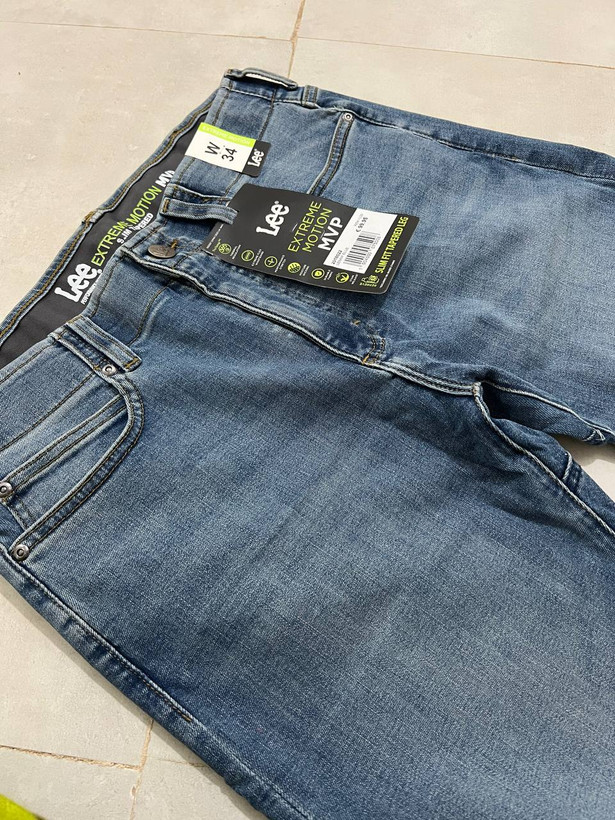 شلوار جین مردانه برند لی Lee اورجینال مدل Slim Fit رنگ آبی Lenny Blue