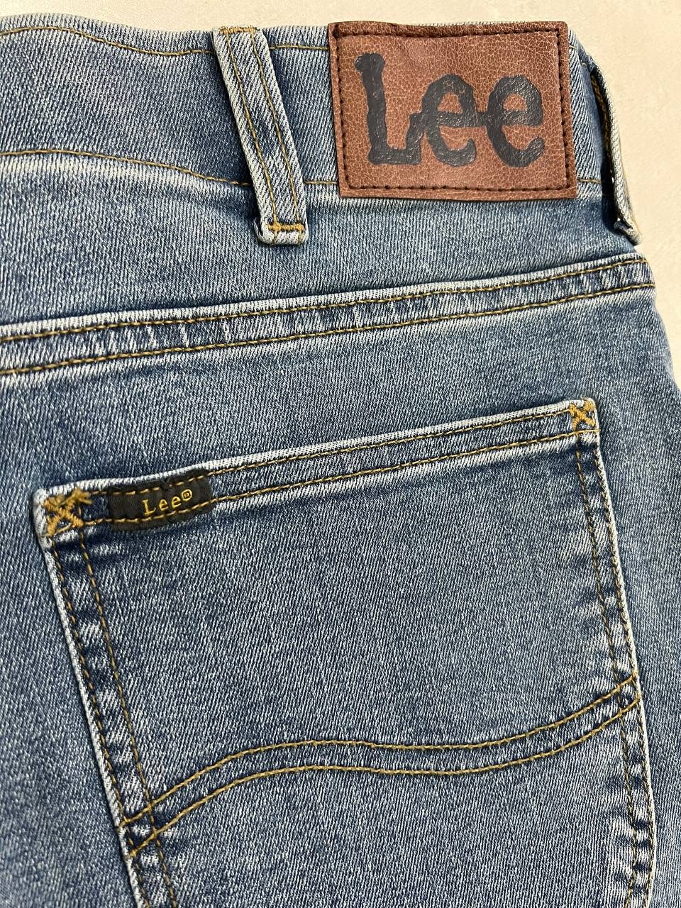 شلوار جین مردانه برند لی Lee اورجینال مدل Slim Fit رنگ آبی Lenny Blue