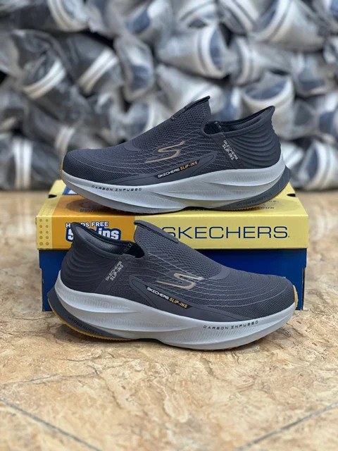 کتونی وارداتی اسکیچرز بدون بند مسترکوالیتیSkechers Slip _Ins Ultra Go Sole Memory Foamساخت ویتنام وارداتی سایز ۴۰ الی ۴۵مخصوص پا درد و کمر درد با زیره فوق العاده طبی و راحت فروش تکی و عمده ضمانت کیفیت کالا