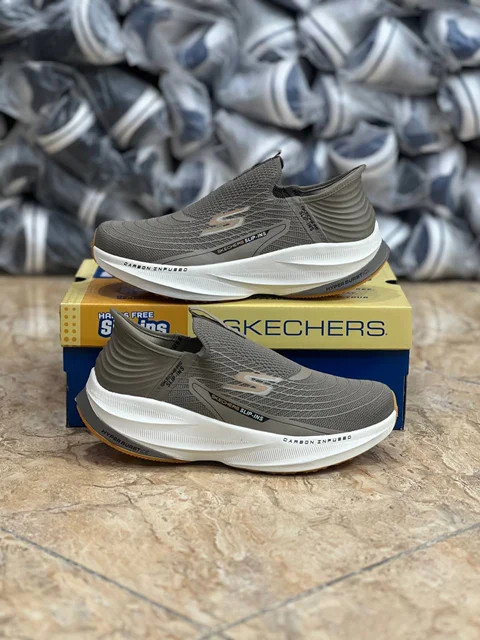 کتونی وارداتی اسکیچرز بدون بند مسترکوالیتیSkechers Slip _Ins Ultra Go Sole Memory Foamساخت ویتنام وارداتی سایز ۴۰ الی ۴۵مخصوص پا درد و کمر درد با زیره فوق العاده طبی و راحت فروش تکی و عمده ضمانت کیفیت کالا