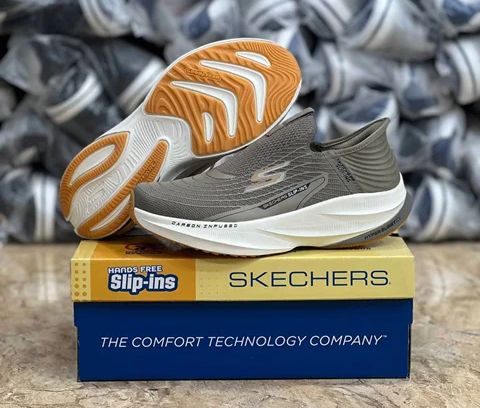 کتونی وارداتی اسکیچرز بدون بند مسترکوالیتیSkechers Slip _Ins Ultra Go Sole Memory Foamساخت ویتنام وارداتی سایز ۴۰ الی ۴۵مخصوص پا درد و کمر درد با زیره فوق العاده طبی و راحت فروش تکی و عمده ضمانت کیفیت کالا